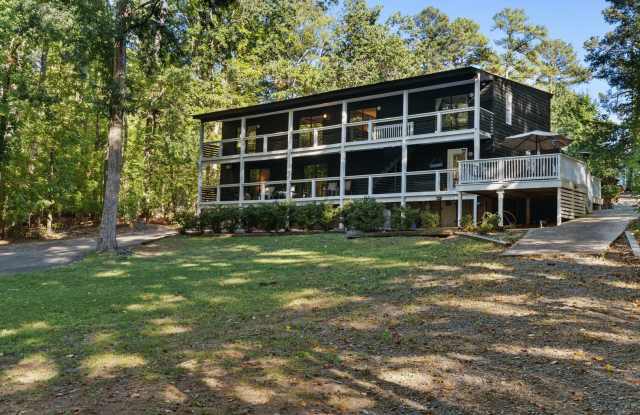 Enjoy waterfront living at 218 Club Drive in Littleton, NC! Gallery 1