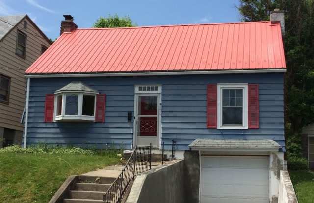 Spacious 4BR 2 Bath Cape in Great Location with Garage photos photos
