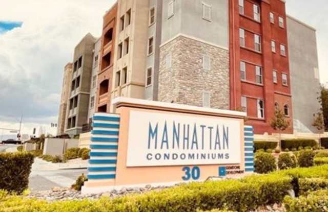 SPACIOUS BOTTOM FLOOR 2 BEDROOM IN THE GATED MANHATTAN CONDOS photos photos