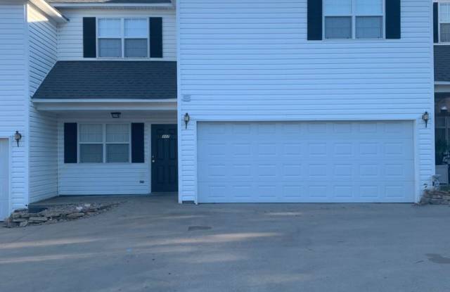 Spacious 3-Bed, 2.5-Bath Fourplex with Garage in McAlester photos photos