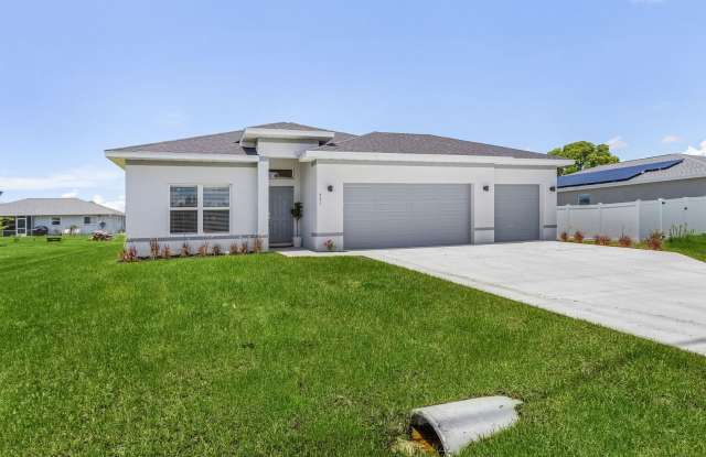 Brand-New 4-Bedroom Home with 3-Car Garage in Cape Coral! photos photos
