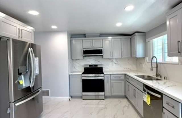 Spacious & Beautifully Upgraded 2-Bedroom Home with Private Yard Gallery 1