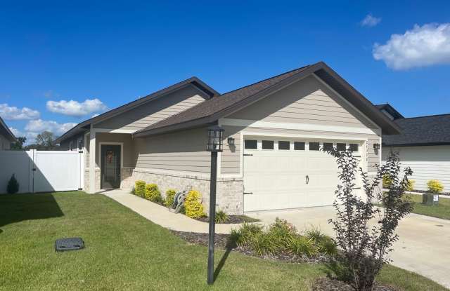 2/2 Countryway -Welcome to 24328 SW 17th Ln., a stunning 2-bedroom, 2-bath home in the sought-after area of Newberry. photos photos