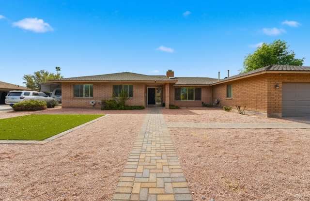 Welcome to this beautiful 4-bedroom, 3-bathroom home in Tempe Arizona! photos photos