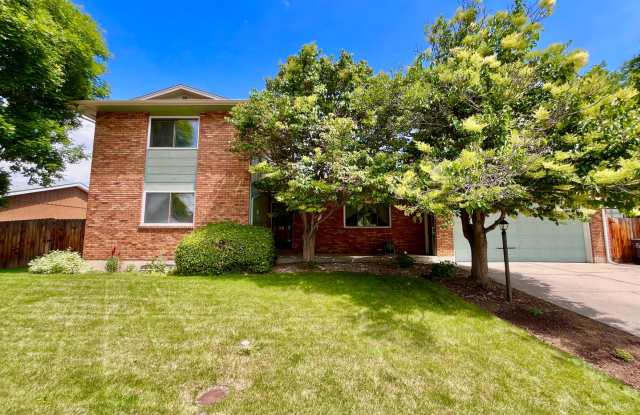 Spacious 4 bed/ 3 bath Two Story Home with Finished Basement - Lawn and Garden Care Included, New Paint Throughout photos photos