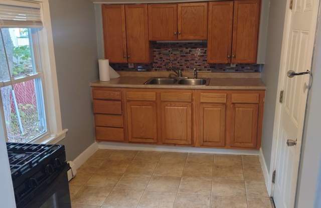 2 Bedroom Single Cottage Family Home in Woonsocket with a small yard! Section 8 are welcome! Gallery 4