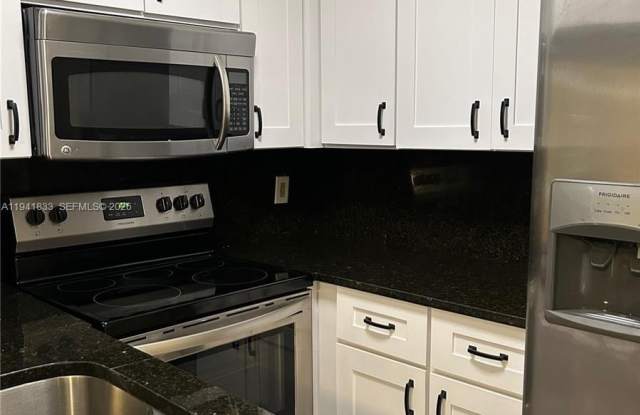 10027 Winding Lake Rd photos photos