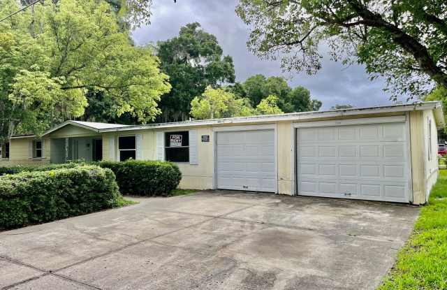 4BR/ 1BA Plant City Home with Oversized 2 Car Garage - 1302 East Church Street, Plant City, FL 33563
