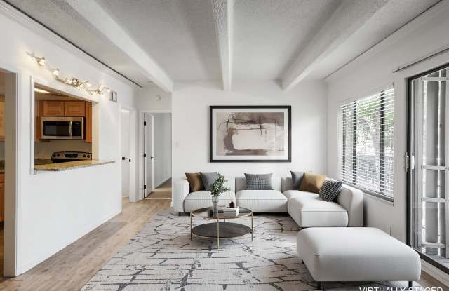 Cozy Condo Retreat – Stylish 1-Bedroom with Fireplace & Balcony Near Dining & Shopping! Gallery 1