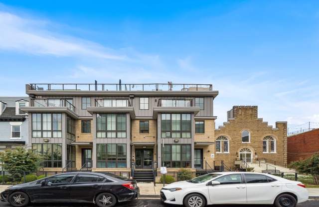 Stylish 2BR/2BA Bi-Level Condo with Private Roof Deck and Covered Parking! photos photos