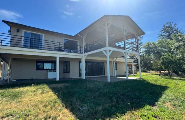 PRIVATE ONE OF KIND THAT SITS ATOP A HILLSIDE W/ VIEWS photos photos