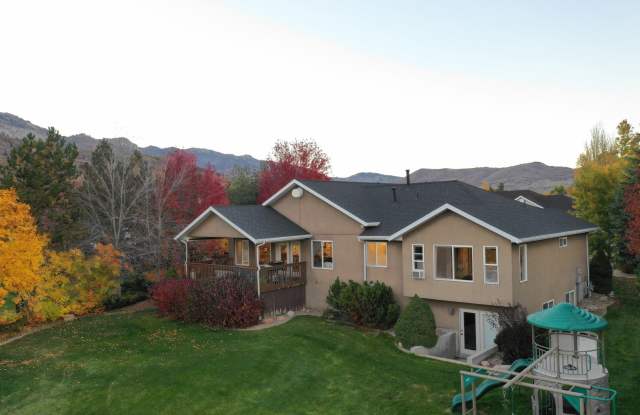Beautiful home with 3 car garage and oversized covered deck. photos photos