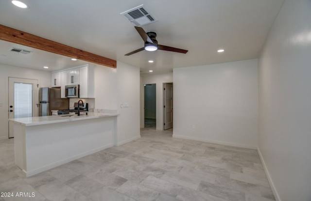 Absolute Stunner blocks from ASU Main Campus!!! Full remodeled, New AC, Large private yard!!! All upgraded appliances included!!! The best of Tempe and Location is Superior!!! Available NOW!!! photos photos