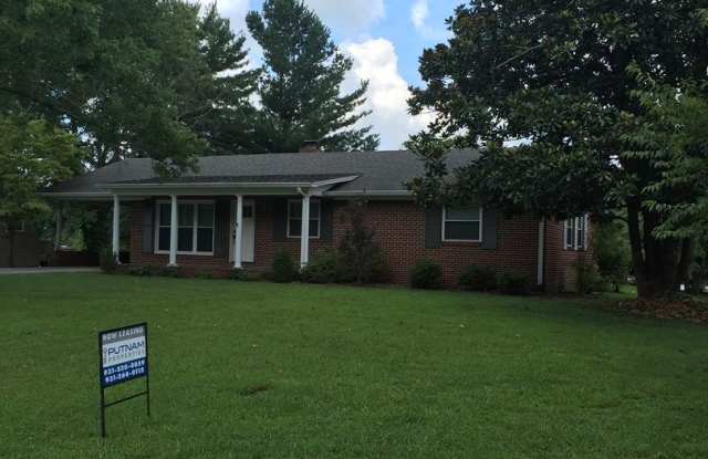 Cookeville Home with Hardwood Floors, Brick Fireplace, and Covered Porch photos photos