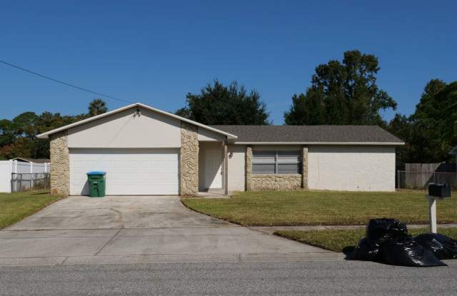 Spacious 4/2 home with 2 car garage Available Now in Winter Springs! photos photos