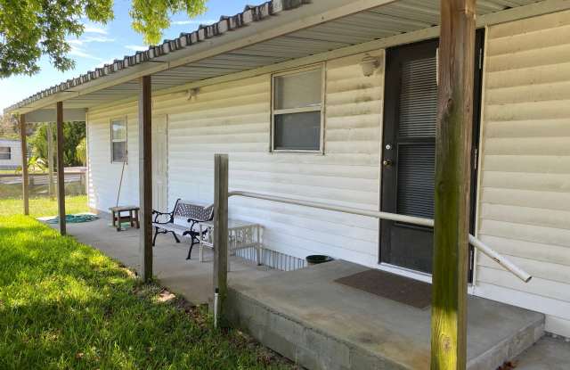 3 bedroom, 2 bath mobile home with a boat lift on a canal - 100 Lewis Street, Volusia County, FL 32141