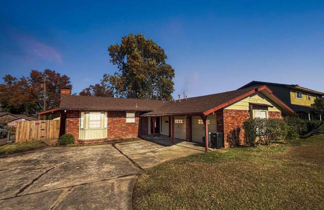 Spacious 3 Bed/3 Bath Midtown Home with Oversized Garage, Large Deck, and Storage Shed photos photos