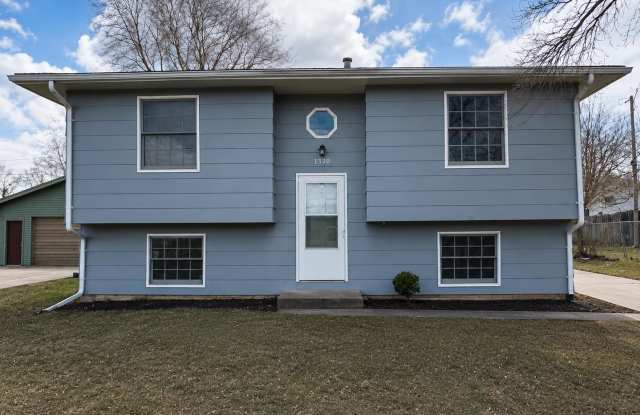 Spacious Split-Level Home With Garage and Fenced Yard in Rock Island! photos photos
