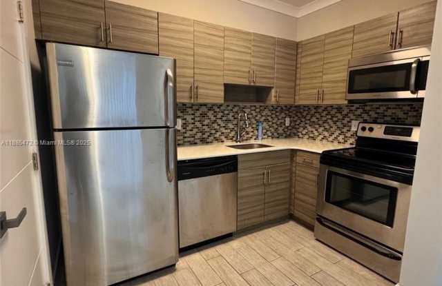 115 Menores Ave - 115 Menores Avenue, Coral Gables, FL 33134