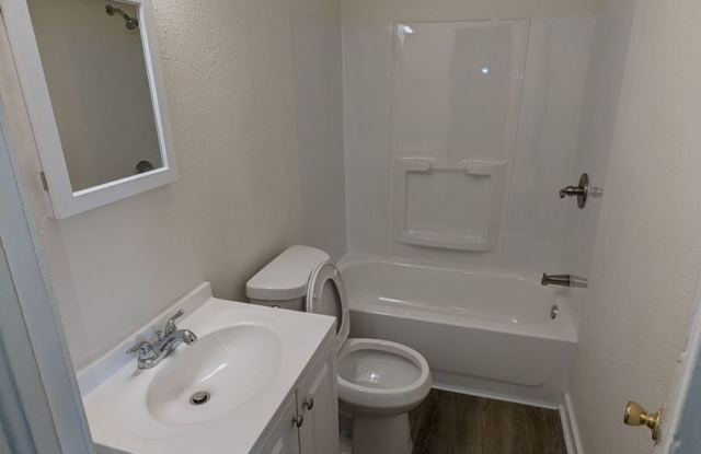 Ground Level 2 Bedroom, 2 Bath apartment. New flooring and paint. Tenant pays electric and natural gas. Water, Sewer, Trash included with monthly rent. Apply online at Homeboundprops.com photos photos