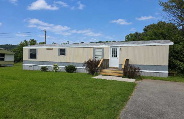 2-Bedroom Home with New Wooden Deck in a Peaceful Sparta Setting Gallery 1