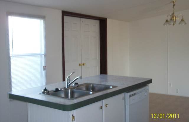 3 bedroom, 2 bath, large bonus room, large covered porch, mobile home photos photos