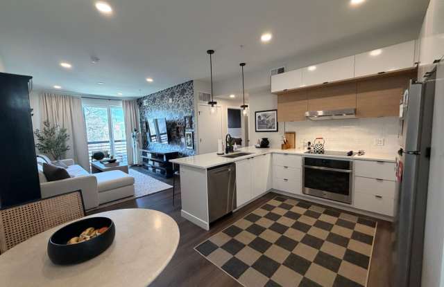 Top‑Floor Corner Condo with Downtown Views — Stylish, Pristine, and Steps From Everything photos photos