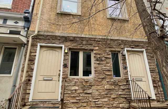 Modern Bi-Level 1st Fl. 2 Bed, 2 Bath Northern Liberties Condo w/ one parking space, C/A, W/D, H/W Fls and more! photos photos