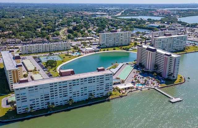 Resort-Style Waterfront Living in a 55+ Gated Community! photos photos