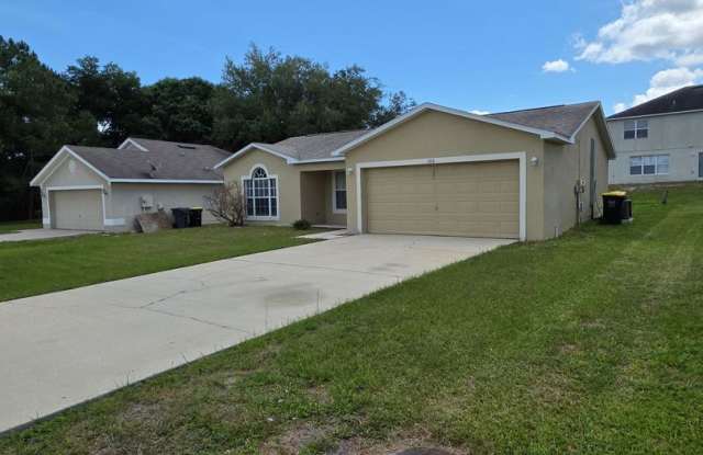 Charming 3-Bedroom Home with New Roof in Quiet Poinciana Location! Gallery 3