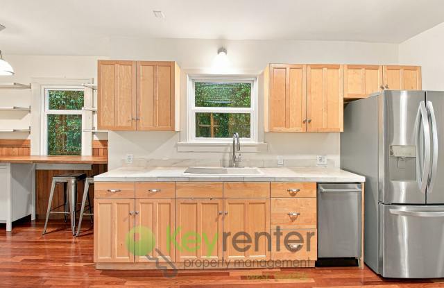 $1,000 MOVE-IN INCENTIVE** Luxury Craftsman Living with Professional Landscaping Included Gallery 3