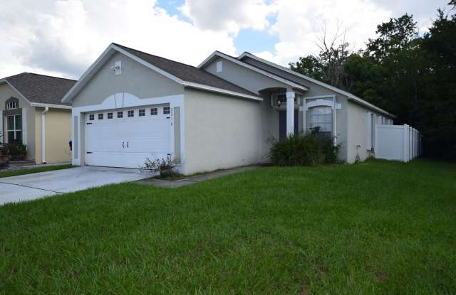 This charming 3 Bedroom, 2 Bath Single Family Home For Rent at 2216 Phonecia Ct. Orlando, FL 32837 Gallery 1
