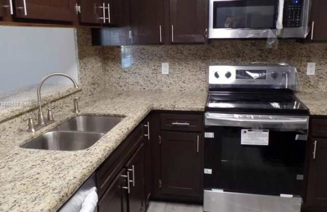 Beautifully Renovated 1-Bedroom, 1-Bathroom Condo in the Gated Community of Royal Poinciana! photos photos