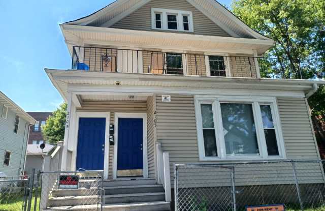 This spacious 3-bedroom lower level duplex features gorgeous hardwood floors, classic woodwork photos photos