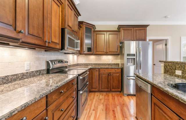 Captivating 3 bedroom house available for rent, wood floors, garage, screened porch renting for $2695 per month photos photos