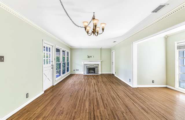 Expansive Three-Bedroom Home with Front and Back Yard in Long Beach AVAILABLE NOW photos photos