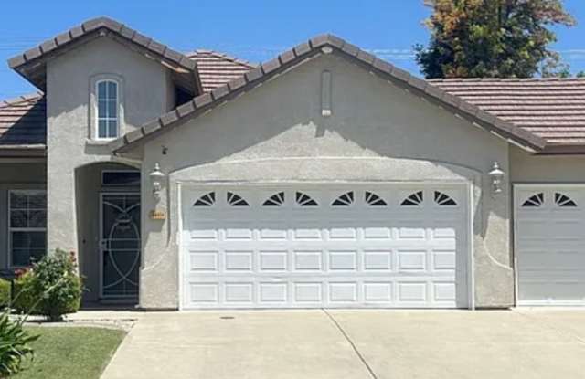 Super cute home with 3 car garage in a desirable northeast Modesto neighborhood photos photos