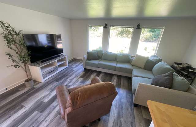Charming 4-Bedroom with Open Floor Plan  Fenced Yard photos photos