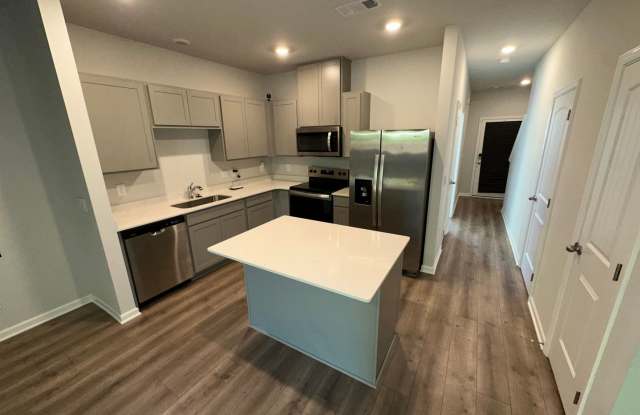 FOR LEASE- Townhome Nestled on a quiet dead-end road, perfect for those seeking privacy and peaceful surroundings. Gallery 3