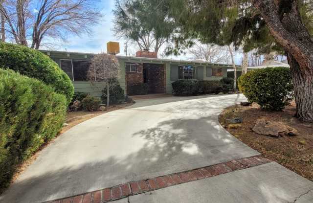 Mostly Furnished Bishop home with large living, dining space and a sun room. photos photos