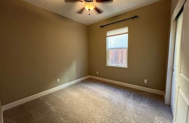 Low traffic street, close to shopping, dining, parks, trails, schools and much more! Gallery 3