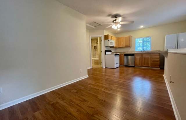 Spacious One Bedroom in Quiet 5 Plex with Courtyard Setting~ Open Floor Plan~ Great Shared Outdoor Space~ Off Street Parking! photos photos