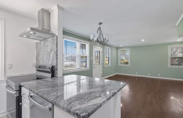 Freshly Renovated Cammack Village Home with Hardwood Floors & Spacious Backyard Gallery 3
