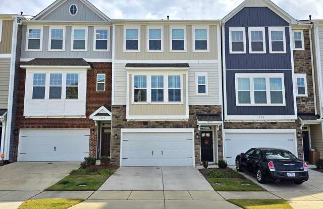 4 Bedroom 3.5 Bathroom Townhome w/ Upgraded Finishes and fenced in yard. Located in the heart of Brier Creek Gallery 1