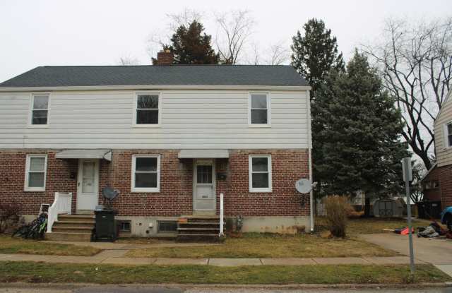 Spacious 4-Bedroom Townhome with Off-Street Parking photos photos