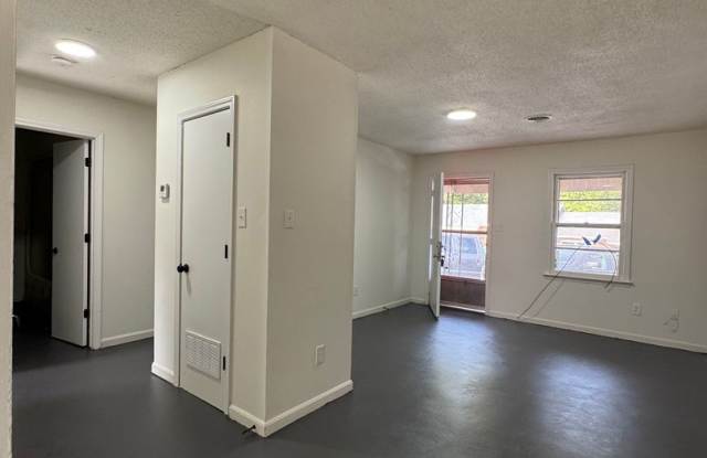 This freshly repainted and refreshed single-story brick duplex- End Unit photos photos