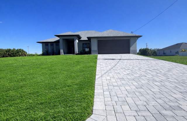 Live in Luxury - Pool, Pavers, 16' Ceilings - This is NOT a Cookie-Cutter Home photos photos