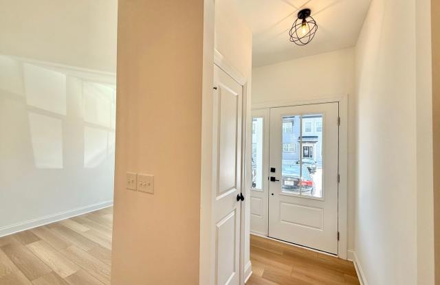 **OFFERING $150 RENT DISCOUNT FOR FIRST 6 MONTHS, REFUNDABLE APPLICATION FEES & $150 MOVE IN PROMOTION** Newly Built 4BD, 3.5BA Raleigh Townhome in a Great Location Gallery 3