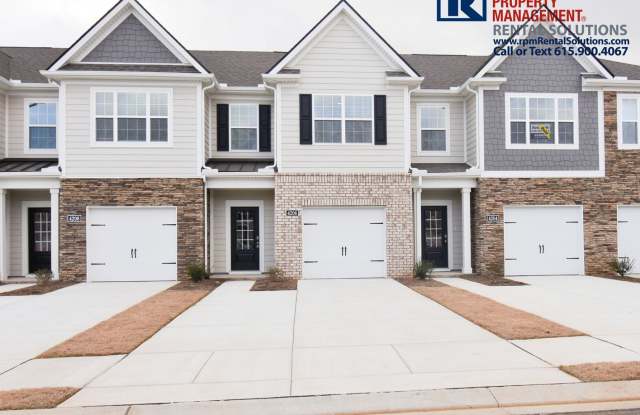 Like new 3bd townhome w/ attached 2 car garage & community pool! Washer/dryer included! photos photos