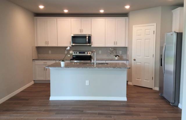 Stunning 2 floors 4/3 Water View Home x Rent is located close to Lake Nona Medical City, Theme Parks, International Airport, Cocoa Beach, and Melbourne Beach. Gallery 1